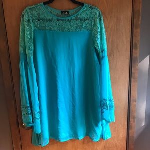 Lace, flowy, mini blue dress.